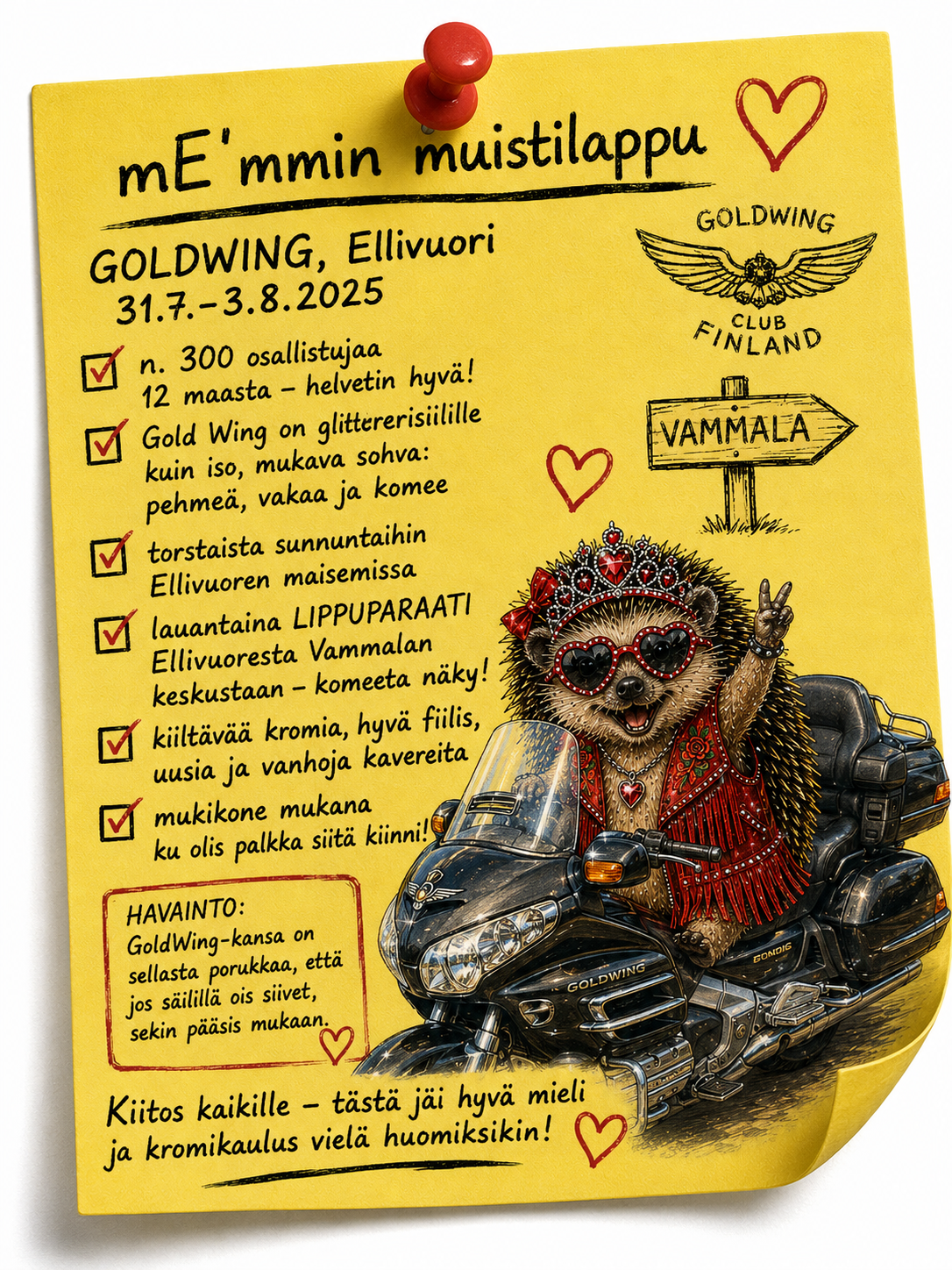 Hellulandian mE'mmi GoldWing Club Finlandin International Finnish Goldwing Rally 2025 -tapahtumassa Ellivuoressa, taustalla Honda Gold Wing -moottoripyörä ja Vammalan lippuparaati.